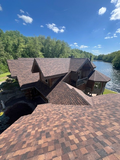Lakefront home with premium shingle roof