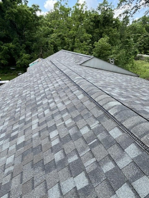 Weathered Wood architectural asphalt shingles showing natural wood-tone texture