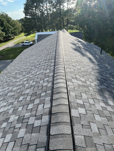 Espresso dark brown architectural asphalt shingles installed by professional roofers